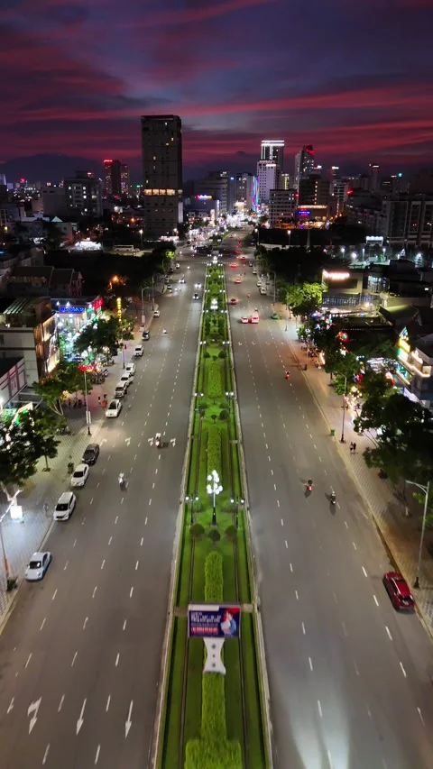 Aerial View Flying Over Da Nang, Vietnam City Street at Night 스톡 동영상 335846692