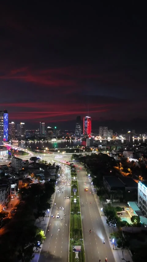 Aerial View Flying Over Da Nang, Vietnam City Street at Night Stock Footage 335846872
