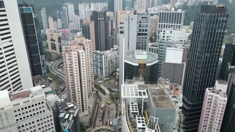 Aerial View Flying Over Dense Hong Kong Cityscape Video stock 335812008