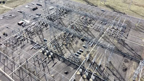 Aerial view flying over electrical substation infrastructure Video stock 336876250