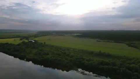 Aerial View Flying over the field. Flying over the river. Russia Stock Footage 134906972