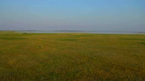 Aerial View: Flying over fields and lakes. Altai. Siberia Stock Footage 11519516