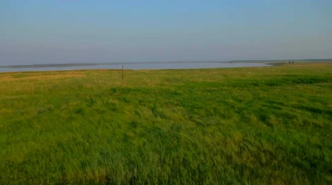 Aerial View: Flying over fields and lakes. Altai. Siberia Stock Footage 11519544