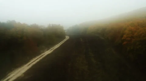 Aerial View: Flying over the forest in a fog, near Bakhchisaray, Crimea Stock Footage 36820209