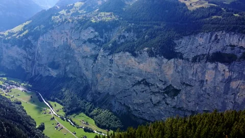Aerial View of Flying Over the Forest into Beautiful Valley - No2 Stock Footage 140761393