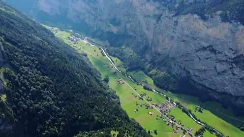 Aerial View of Flying Over the Forest into Beautiful Green Valley - No4 Stock Footage 140761497
