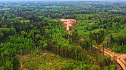 Aerial view flying over a future wind farm construction site in a vast and Stock Footage 341384403