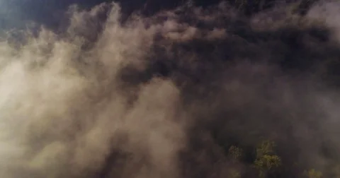 Aerial View. Flying over the high mountains in beautiful clouds . Aerial camera 스톡 동영상 82533040