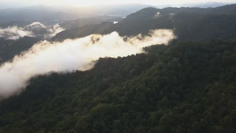 Aerial View. Flying over the high mountains in beautiful clouds morning. Stock Footage 87189673