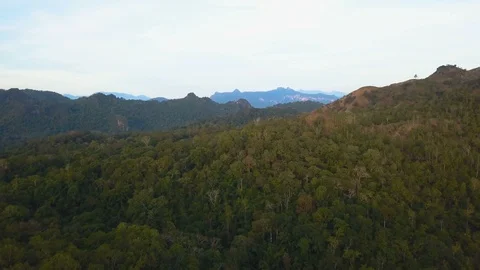 Aerial View. Flying over the high mountains in beautiful clouds morning . Aerial Stock Footage 87190903
