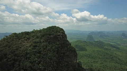 Aerial view flying over the high mountain towards beautiful seascape horizon. Stock Footage 88644089