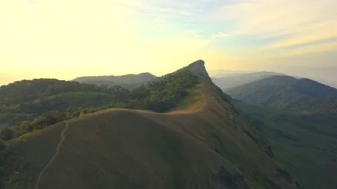 Aerial View. Flying over the high mountains, name Doi Mon Jong with beautiful su Stock Footage 227149532