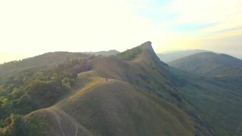 Aerial View. Flying over the high mountains, name Doi Mon Jong with beautiful su Stock Footage 231020688