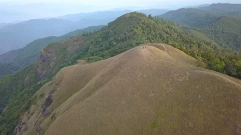 Aerial View. Flying over the high mountains, name Doi Mon Jong with beautiful su Stock Footage 235587053