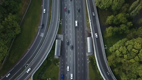 Aerial view flying over of loaded cars with traffic jam at rush hour on highway Stock Footage 154994264