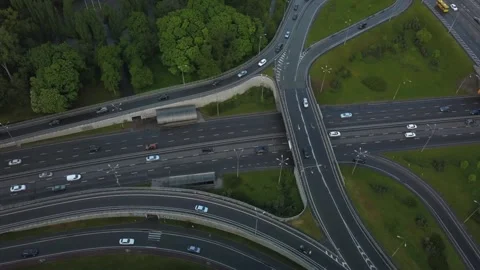 Aerial view flying over of loaded cars with traffic jam at rush hour on highway Stock Footage 155098428
