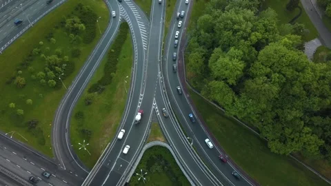 Aerial view flying over of loaded cars with traffic jam at rush hour on highway Stock Footage 155098472