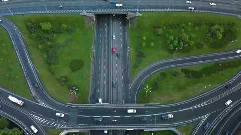 Aerial view flying over of loaded cars with traffic jam at rush hour on highway Stock Footage 155165012