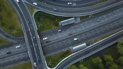 Aerial view flying over of loaded cars with traffic jam at rush hour on highway Stock Footage 155183337