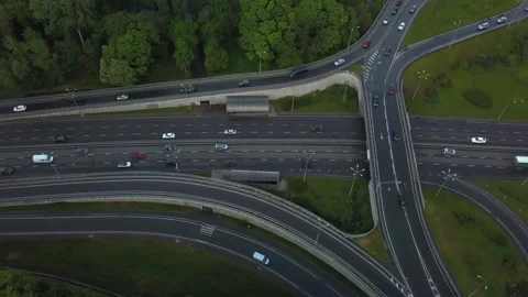 Aerial view flying over of loaded cars with traffic jam at rush hour on highway Stock Footage 155477282