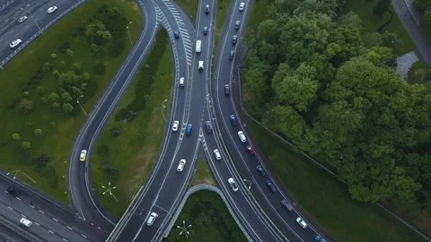 Aerial view flying over of loaded cars with traffic jam at rush hour on highway Stock Footage 156441284
