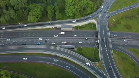 Aerial view flying over of loaded cars with traffic jam at rush hour on highway Stock Footage 156735552
