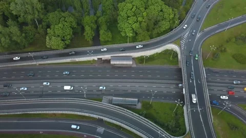 Aerial view flying over of loaded cars with traffic jam at rush hour on highway Stock Footage 157474005