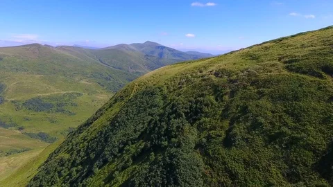 Aerial view: flying over low altitude mountain range in Ukraine Stock Footage 79094098