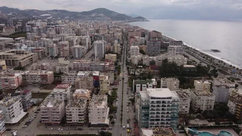 Aerial View Flying over the Main Street in the Resort Town Near the Embankment Stock Footage 204719692