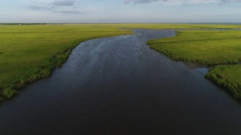 Aerial View Flying over the Marsh and Delaware Bay Beach New Jersey Stock Footage