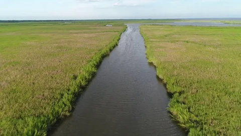 Aerial View Flying over the Marsh and Delaware Bay Beach New Jersey Stock Footage 78018541