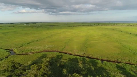 Aerial View Flying over the Marsh and Delaware Bay Beach New Jersey Stock Footage 78018597
