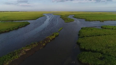 Aerial View Flying over the Marsh and Delaware Bay Beach New Jersey Stock Footage 78020806