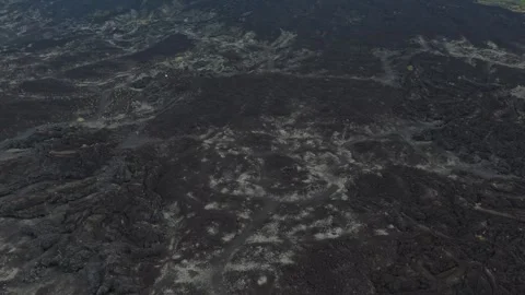 Aerial view flying over mount batur lava fields in bali Stock Footage 328914119