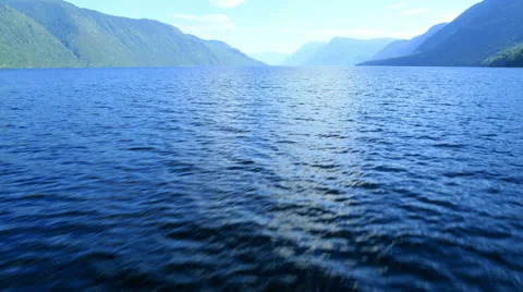 Aerial View. Flying over the mountain lake. Aerial camera shot. Altai, Siberia. Stock Footage 33871809