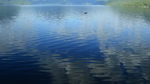 Aerial View. Flying over the mountain lake. Aerial camera shot. Altai, Siberia. Stock Footage 33911792