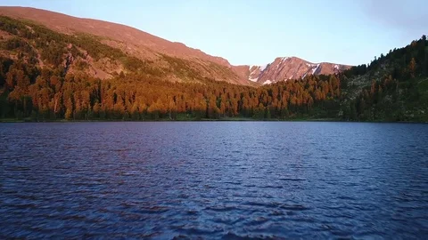 Aerial View. Flying over the Mountain Lake. Altai. Siberia. Karakolsky Lakes 動画素材 77492353