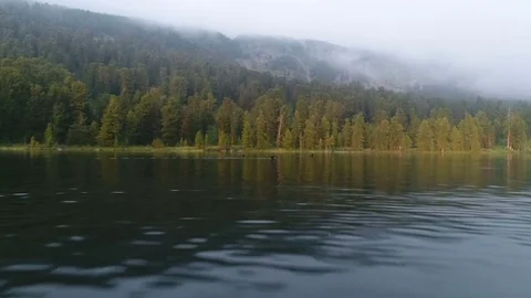 Aerial View. Flying over the Mountain Lake. Altai. Karakolsky Lakes Expedition Stock Footage 78959231