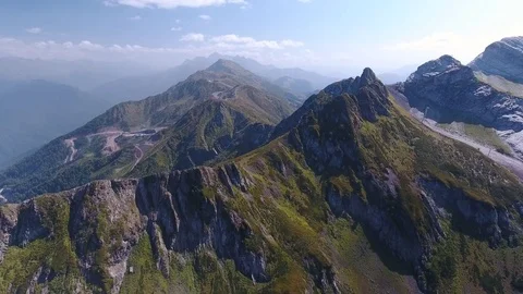 Aerial View. Flying over the mountain Aibga Krasnaya Polyana in Sochi. Video stock 80230333