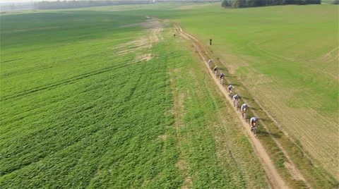Aerial view flying over MTB marathon by HeliDog_Aerials Stock Footage 10922089