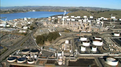 Aerial view flying over an oil refinery, San Francisco Stock Footage