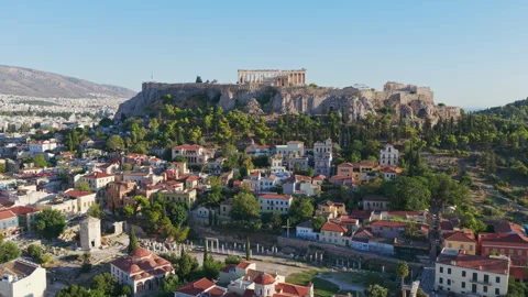 Aerial view flying over the Plaka district and the Acropolis of Athens Stock Footage 345412056