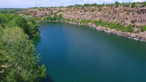 Aerial view: Flying Over Quarry Lake Video stock 80904560