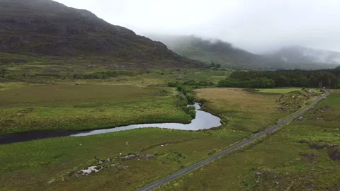 Aerial View Flying Over a Remote River Valley Video stock 242869907