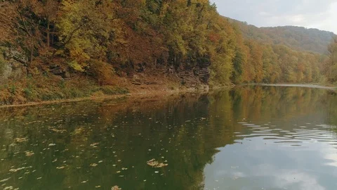 Aerial view: Flying over the river. Incredible autumn landscape Vídeos de archivo 97277486