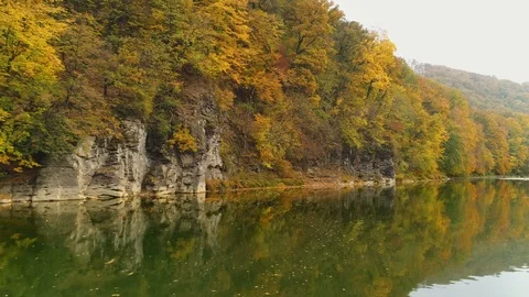 Aerial view: Flying over the river. Incredible autumn landscape Vídeos de archivo 97277655