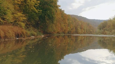 Aerial view: Flying over the river. Autumn landscape 動画素材 97278360