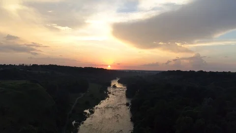 Aerial view, flying over the river at sunset Stock Footage 112614892
