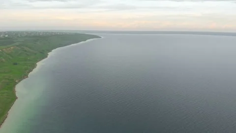 Aerial view flying over river estuary Stock Footage 199497155