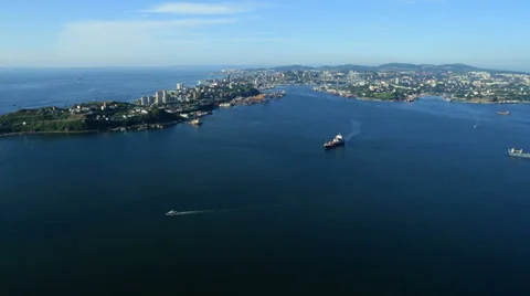 Aerial View. Flying over the seacoast. Harbor of the Vladivostok city. Stock Footage 34698216